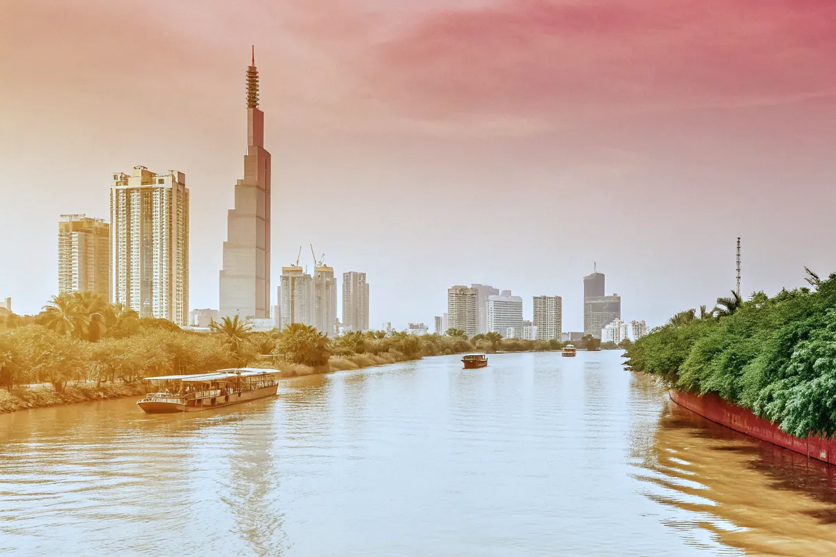 The Saigon River and the Ho Chi Minh City skyline at sunset